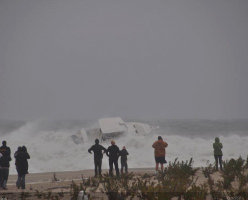 Boat caught in rough surf