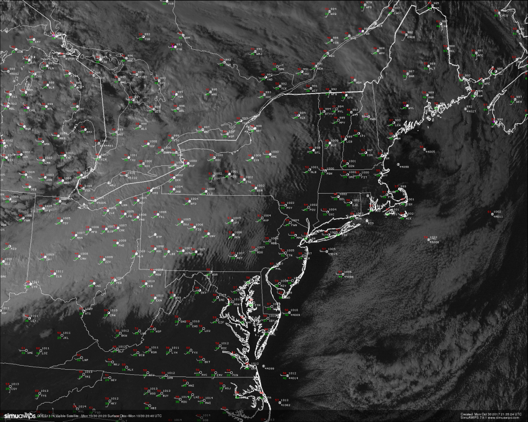 High resolution visible satellite imagery and surface observations over the northeast showing cooling and windy conditions 
